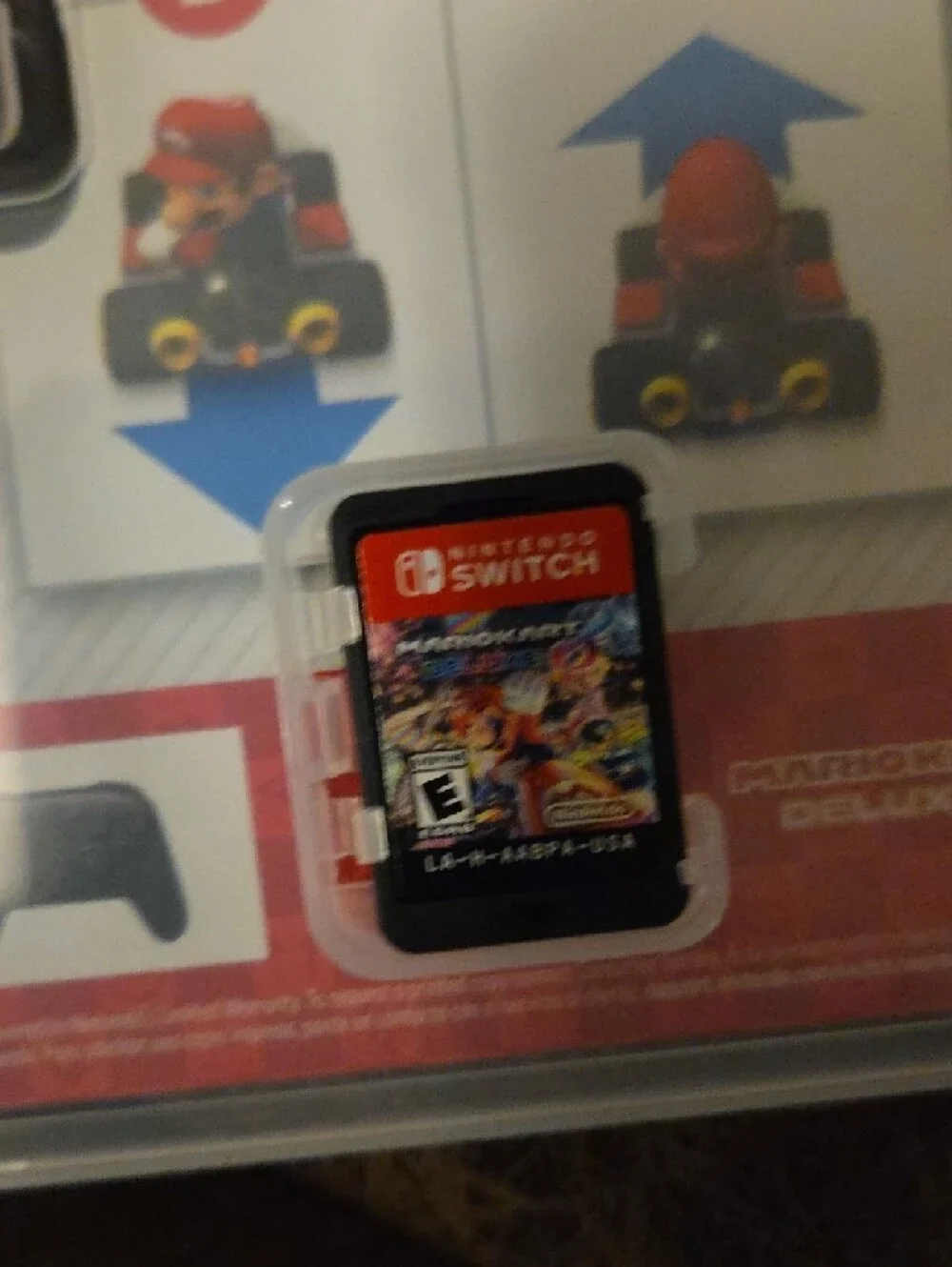 Nintendo Switch with Purple Left & Orange Right Joy-Con Controllers